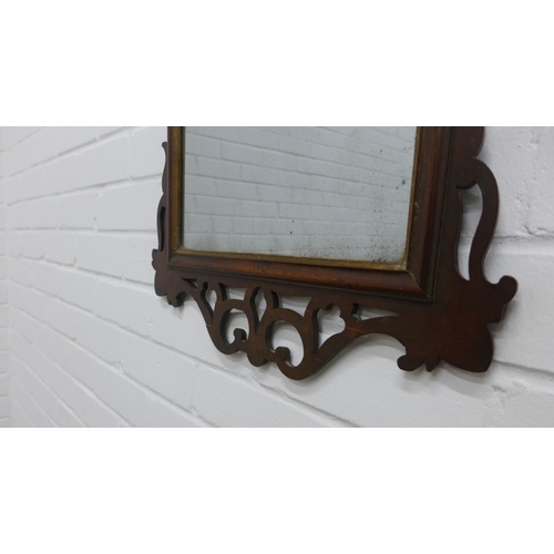 248 - 19th century mahogany fretwork wall mirror. 65 x 44cm