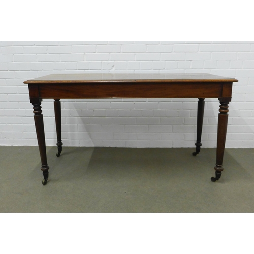 249 - 19th century mahogany table, rectangular top with moulded edge on ring turned legs terminating on br... 