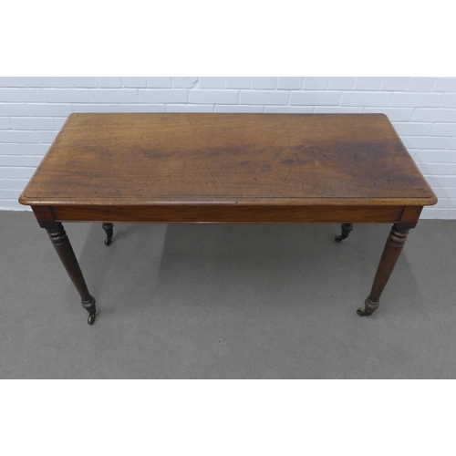 249 - 19th century mahogany table, rectangular top with moulded edge on ring turned legs terminating on br... 