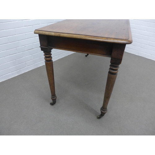 249 - 19th century mahogany table, rectangular top with moulded edge on ring turned legs terminating on br... 