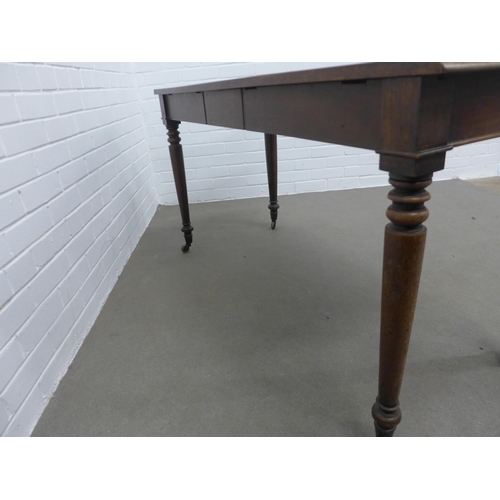 249 - 19th century mahogany table, rectangular top with moulded edge on ring turned legs terminating on br... 