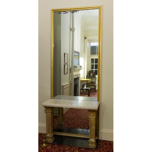 258 - Impressive giltwood pier mirror, the glass plate in two parts, supported by a marble top and giltwoo... 