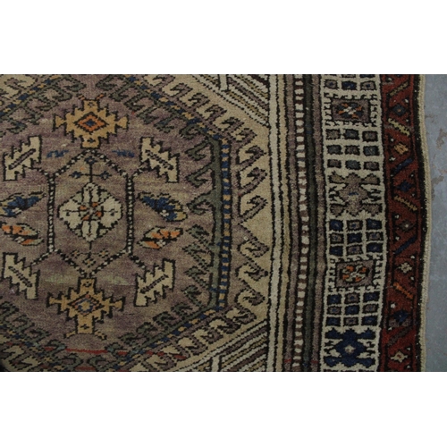 267 - Persian runner, ivory field with a pole medallion and multiple geometric borders,  warped, 310 x 85c... 