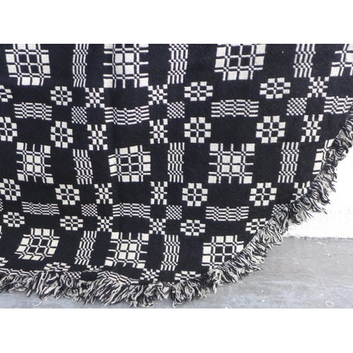 273 - Welsh wool blanket, black and white reversible, 170 x 240cm together with another floral quilt (2)