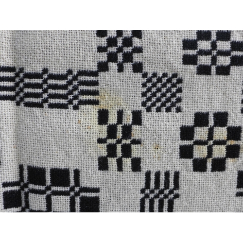 273 - Welsh wool blanket, black and white reversible, 170 x 240cm together with another floral quilt (2)