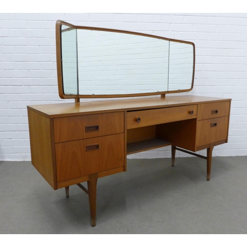 281 - Teak dressing table and stool. Stamped Nathan to the drawer. 110 x 153 x 45cm