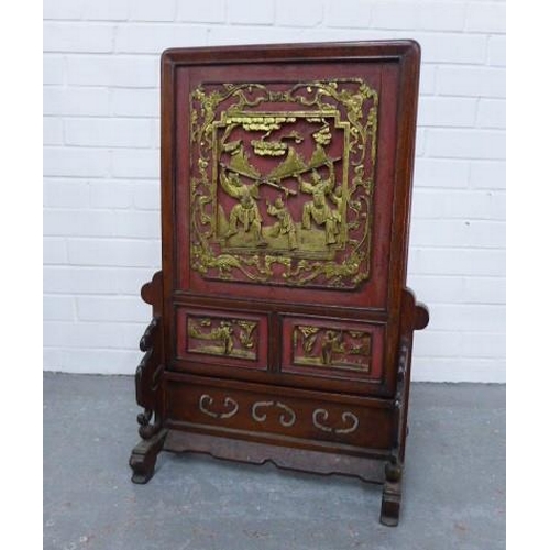 289 - Red and gold chinoiserie carved wooden table screen, 52 x 75cm