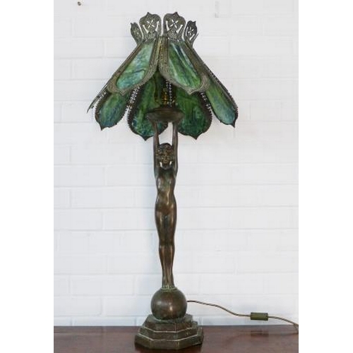 294 - Art deco style figural bronze table lamp, with a Tiffany style shade 98cm tall