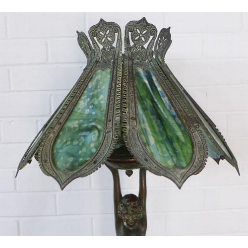 294 - Art deco style figural bronze table lamp, with a Tiffany style shade 98cm tall