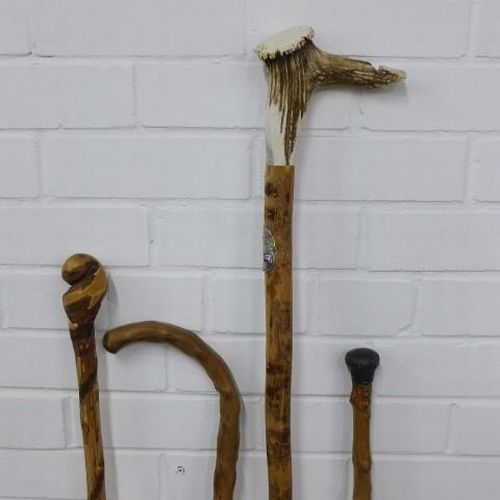 296 - Four walking sticks, longest 124cm (4)