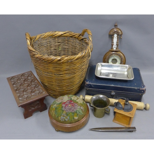 313 - Mixed lot to include a carved oak footstool, wicker basket, bronze mortar, coffee grinder, barometer... 