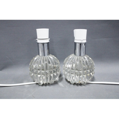 344 - A pair of glass table lamps of small size, with facet cut bases, 13cm excluding fittings (2)