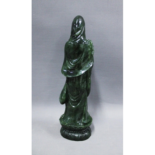 359 - Guanyin, a carved jadeite figure,  29cm