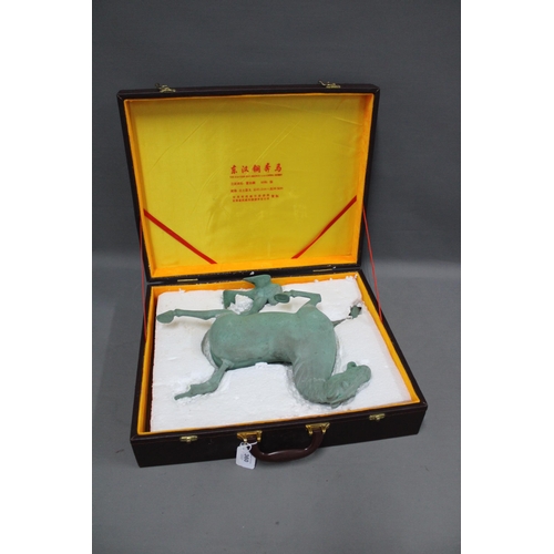 360 - The Eastern Han Bronze Galloping Horse, 33cm high, in a fitted case