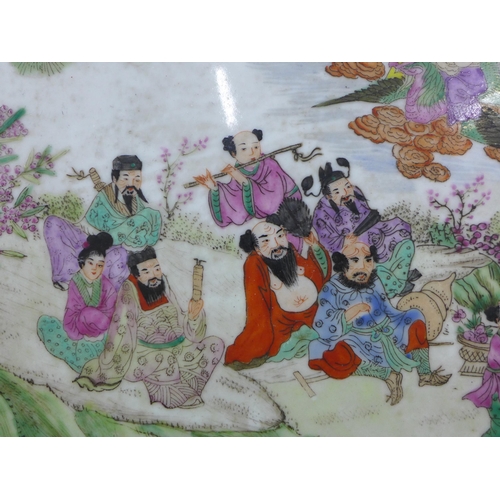 371 - Chinese porcelain plaque depicting the eight immortals in a famille rose enamels, framed with stylis... 