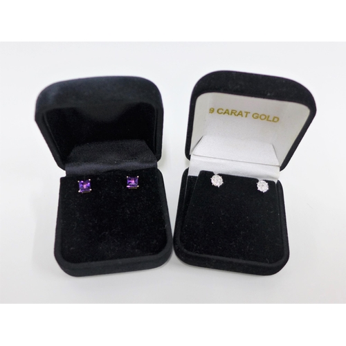 38 - Pair of amethyst stud earrings and a pair of white metal and diamond stud earrings (2)