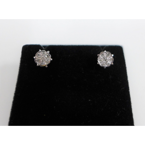 38 - Pair of amethyst stud earrings and a pair of white metal and diamond stud earrings (2)