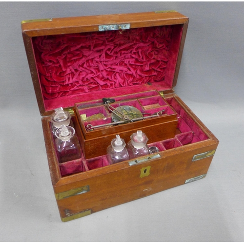 388 - 19th century mahogany and brass bound apothecary box, the hinged lid inscribed John Bruce Esq. The i... 