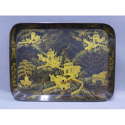 394 - Chinoiserie black lacquer and gilt tray, rectangular form, painted with pagodas, 56 x 42cm