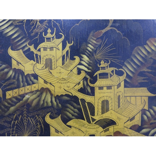 394 - Chinoiserie black lacquer and gilt tray, rectangular form, painted with pagodas, 56 x 42cm