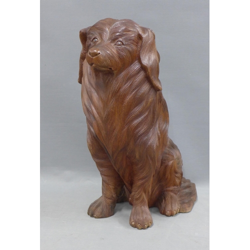 395 - Carved wood model of a seated dog, 43cm