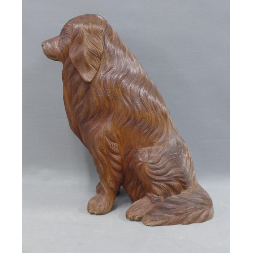 395 - Carved wood model of a seated dog, 43cm