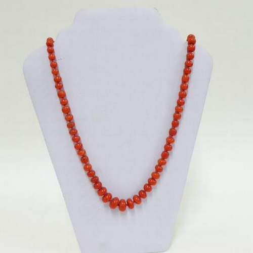 64 - Strand of graduated coral beads, largest bead approx 1.5cm wide