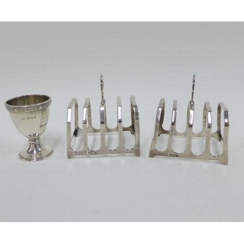 76 - Pair of George V silver toast racks, Sheffield 1925,  George V silver egg cup, London 1932, Hamilton... 