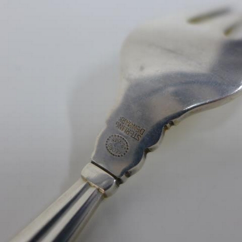 79 - Georg Jensen, Denmark, part suite of acorn pattern sterling silver flatware comprising six grapefrui... 