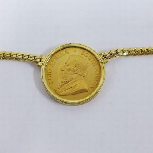 84 - 1974 gold Krugerand / Krűgerrand coin, pendant mounted in 14ct gold with a 14ct gold flattened link ... 