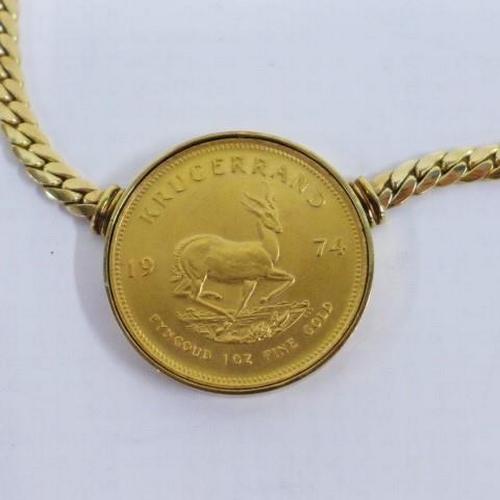 84 - 1974 gold Krugerand / Krűgerrand coin, pendant mounted in 14ct gold with a 14ct gold flattened link ... 