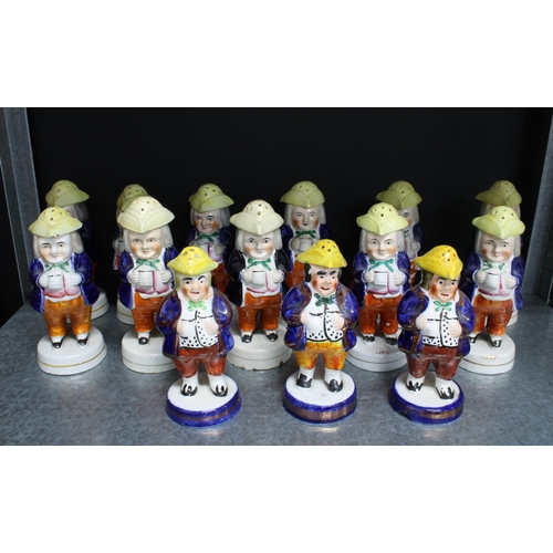 102 - A group of fourteen Staffordshire and Scottish Toby pepper or pounce pots, 14cm (14)