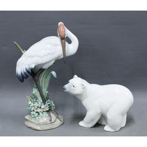 104 - Lladro model of a Crane (a/f) together with a Lladro polar bear figure, both with Lladro Daisa marks... 