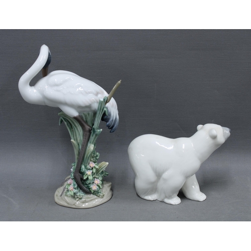 104 - Lladro model of a Crane (a/f) together with a Lladro polar bear figure, both with Lladro Daisa marks... 