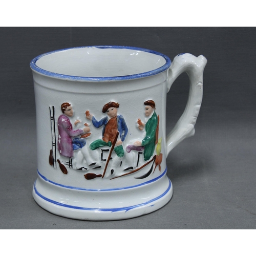 112 - 19th century Staffordshire Frog mug the exterior painted with tavern drinkers with a frog to the int... 