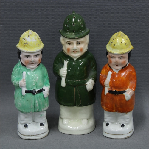 118 - Three Staffordshire 'Policeman' toby pepper pots, 15cm, (3)