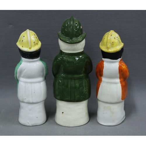 118 - Three Staffordshire 'Policeman' toby pepper pots, 15cm, (3)