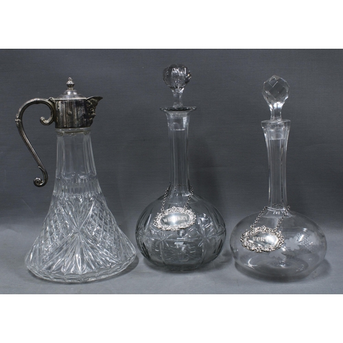 149 - Two 19th century globe and shaft decanters with stoppers together with two Irish silver decanter lab... 