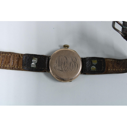 60 - Early 20th century Rolex wrist watch with 9ct gold case, the silvered dial with arabic numerals and ... 