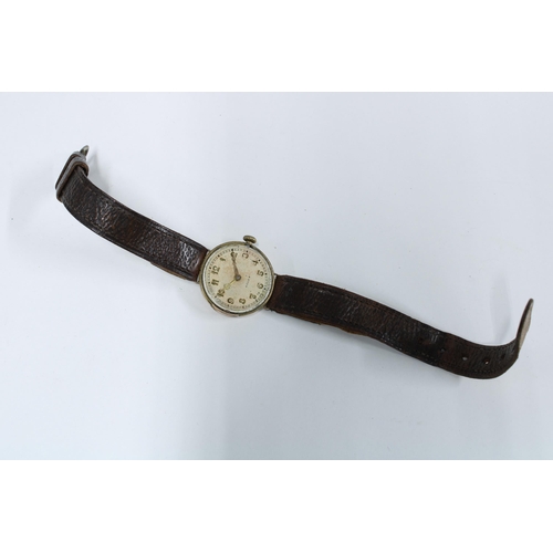 60 - Early 20th century Rolex wrist watch with 9ct gold case, the silvered dial with arabic numerals and ... 