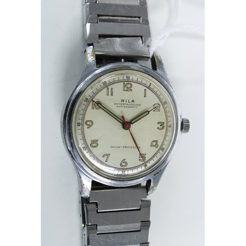 7 - Gents vintage Rila stainless steel wristwatch with champagne dial and Arabic numerals with outer sec... 