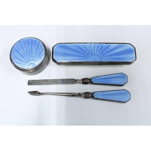 78A - Asprey of London silver and blue enamel manicure set in original blue leather case, comprising circu... 