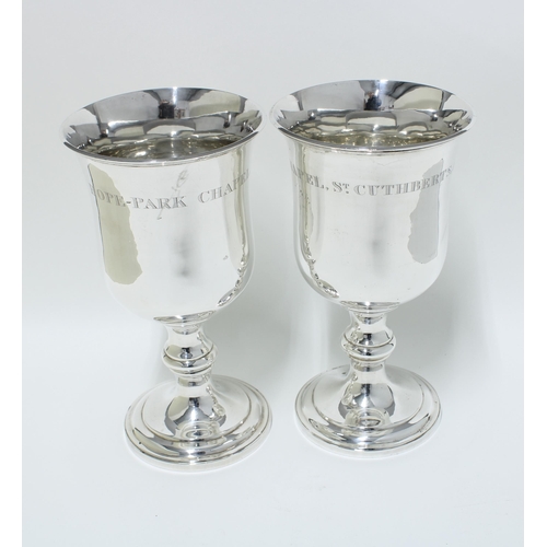 94 - Pair of silver church goblets, knop stemmed with spreading circular footrim, Edinburgh 1823, 23cm (2... 