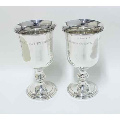 94 - Pair of silver church goblets, knop stemmed with spreading circular footrim, Edinburgh 1823, 23cm (2... 