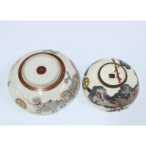 102 - A group of Japanese Satsuma '1,000 Faces' pattern pottery to include a plate and two bowls, with dam... 