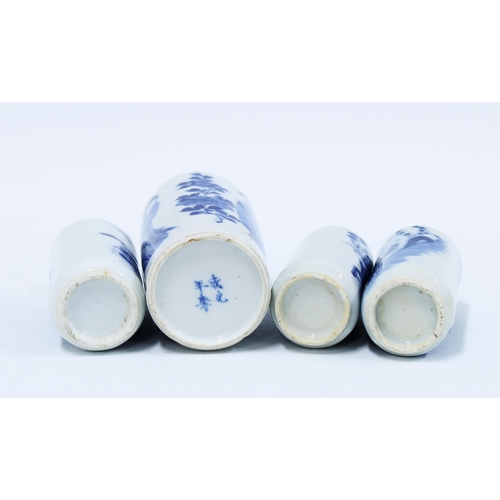 105 - Four Chinese blue and white snuff bottles, one with a Guangxu mark to the base (4) (a/f) 12cm.