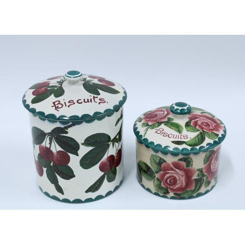 122 - Wemyss Ware cabbage rose pattern biscuit jar and over and a restored  Wemyss plum pattern biscuit ja... 