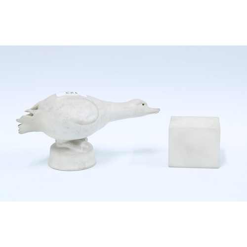 123 - White stone figure of a duck with a seperate stone base, 20cm.