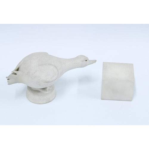 123 - White stone figure of a duck with a seperate stone base, 20cm.