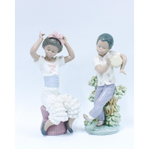 133 - Two Lladro figures to include Rhumba 1560 & Bongo Drum (2) 23cm.